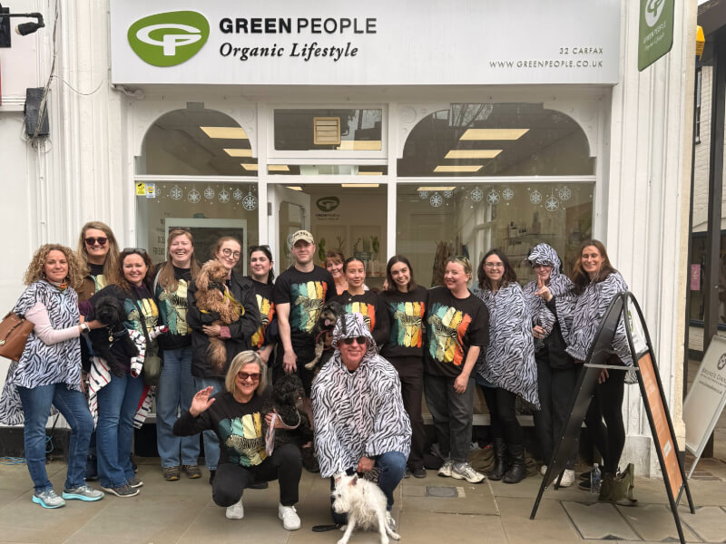 Group of people outside Green people shop